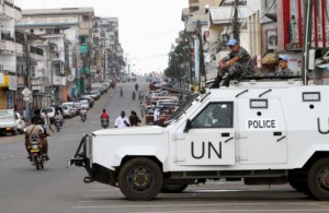 United Nations (UN) peacekeepers patrol in their vehicle during Liberia's presidential election run-off, along a street in Monrovia November 8, 2011. REUTERS/Luc Gnago