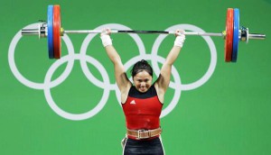 Hidilyn Diaz, of the Philipines, competes in the women's 53kg weightlifting competition at the 2016 Summer Olympics in Rio de Janeiro, Brazil, Sunday, Aug. 7, 2016. Diaz won the silver medal. (AP Photo/Mike Groll)
